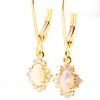 opal earrings set with small diamonds