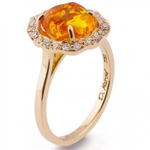 mexican fire opal engagement ring set with diamonds around the opal