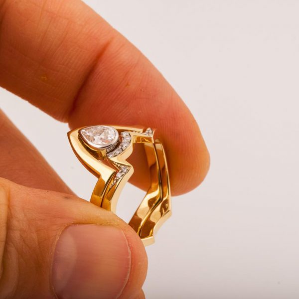 Yellow Gold V Bridal Set Made With a Pear Shaped Diamond Catalogue