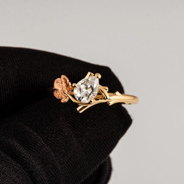 Twig and Fig Leaf Pear Moissanite Ring Yellow and Rose Gold Catalogue