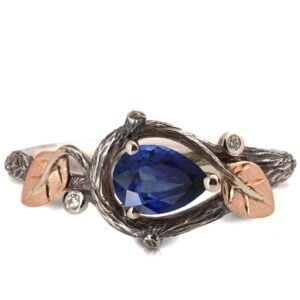 Black and Rose Gold Twig and Leaves Pear Cut Blue Sapphire Engagament Ring Catalogue