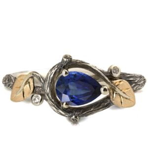 Black and Gold Twig and Leaves Pear Cut Blue Sapphire Engagament Ring Catalogue